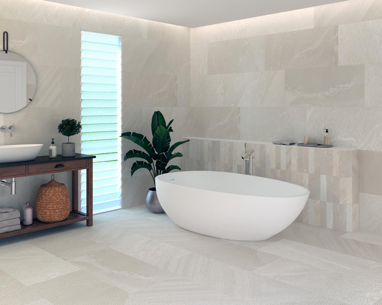 Pietrasanta Ivory 3x11 matte porcelain tile used in a lifestyle space, offering warm tones and elongated form for sleek surface detail.