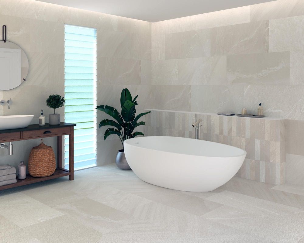 Pietrasanta Ivory 3x11 matte porcelain tile used in a lifestyle space, offering warm tones and elongated form for sleek surface detail.
