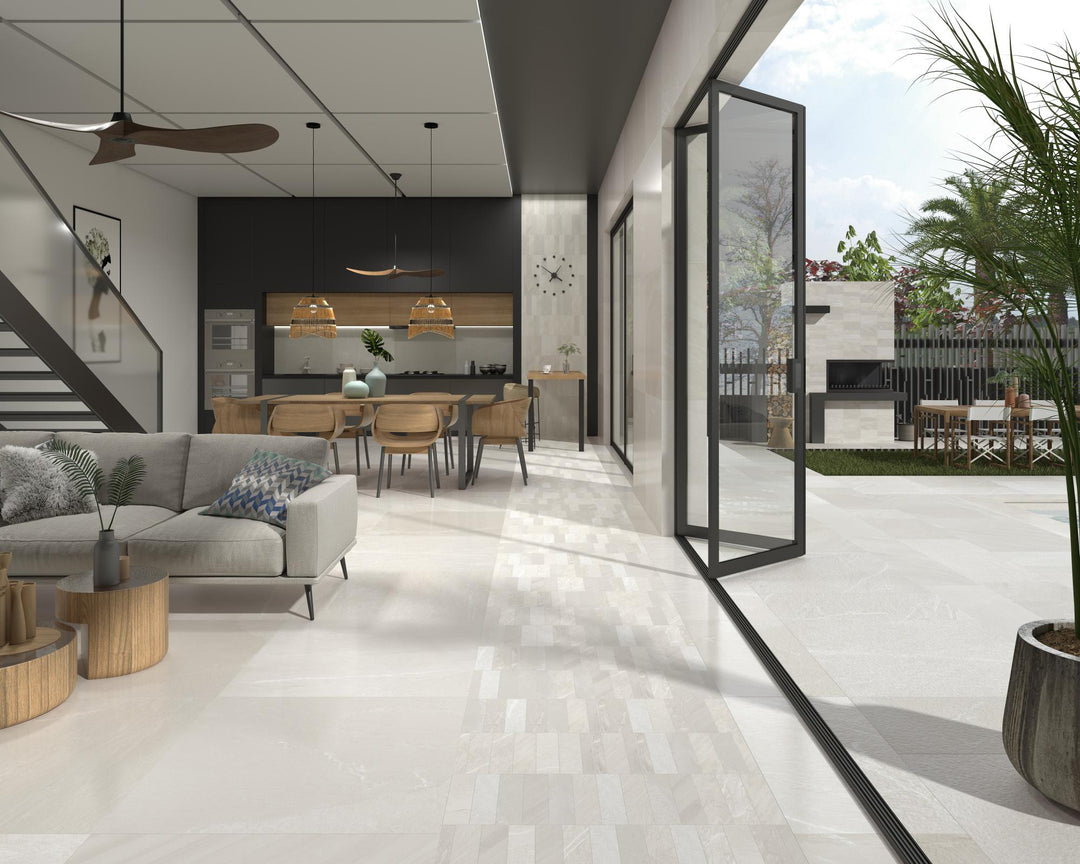 Roomscene featuring Pietrasanta Ivory matte porcelain tile in 3x11 size, ideal for adding linear texture to walls or surfaces.