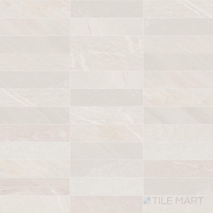 Subtle ivory tones and a long 3x11 format give this matte porcelain tile a soft, linear look.
