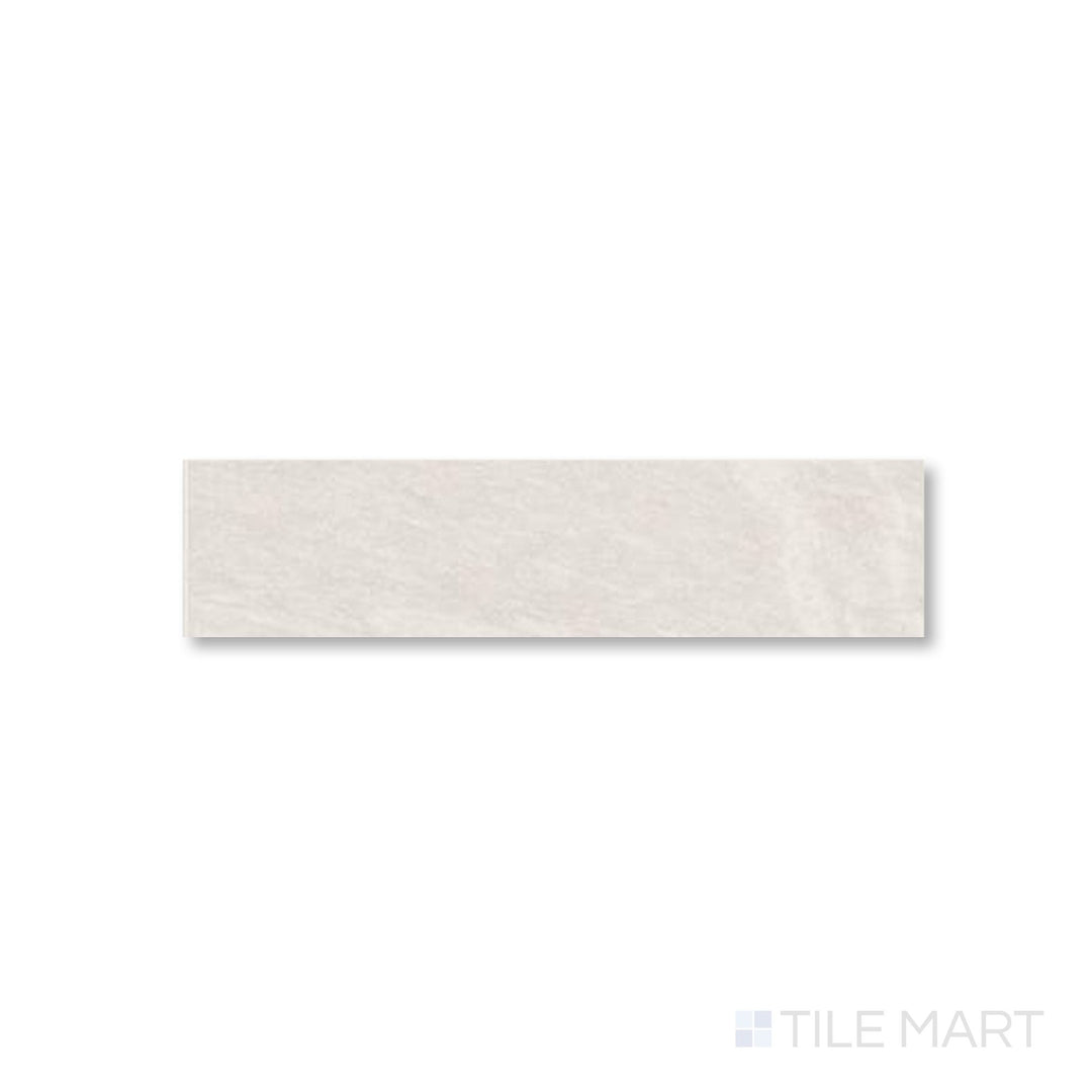Top-down layout of Pietrasanta Ivory 3x11 tile with linear matte surface and soft, creamy undertones.