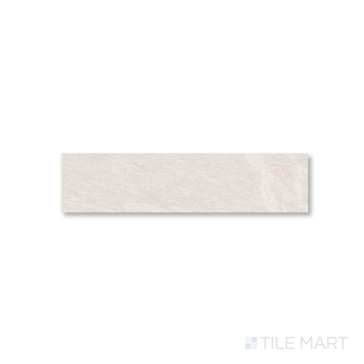 Top-down layout of Pietrasanta Ivory 3x11 tile with linear matte surface and soft, creamy undertones.