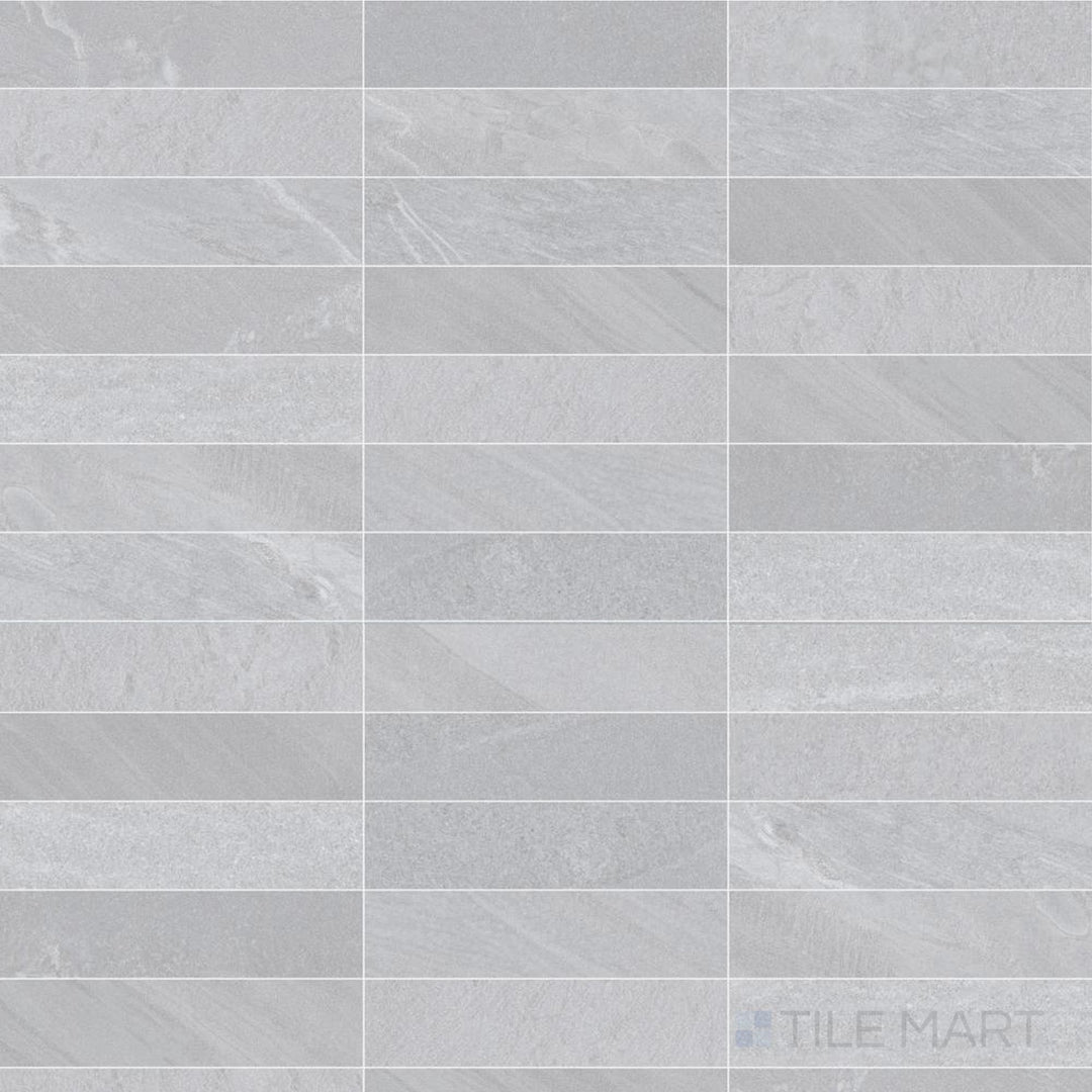 Light grey coloring and a smooth matte finish bring gentle contrast to this 3x11 Pietrasanta porcelain tile.
