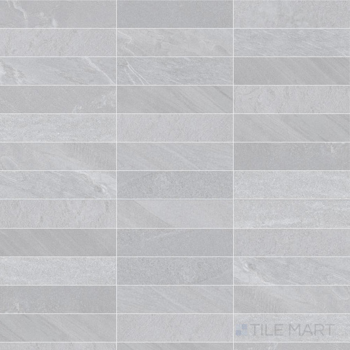 Light grey coloring and a smooth matte finish bring gentle contrast to this 3x11 Pietrasanta porcelain tile.