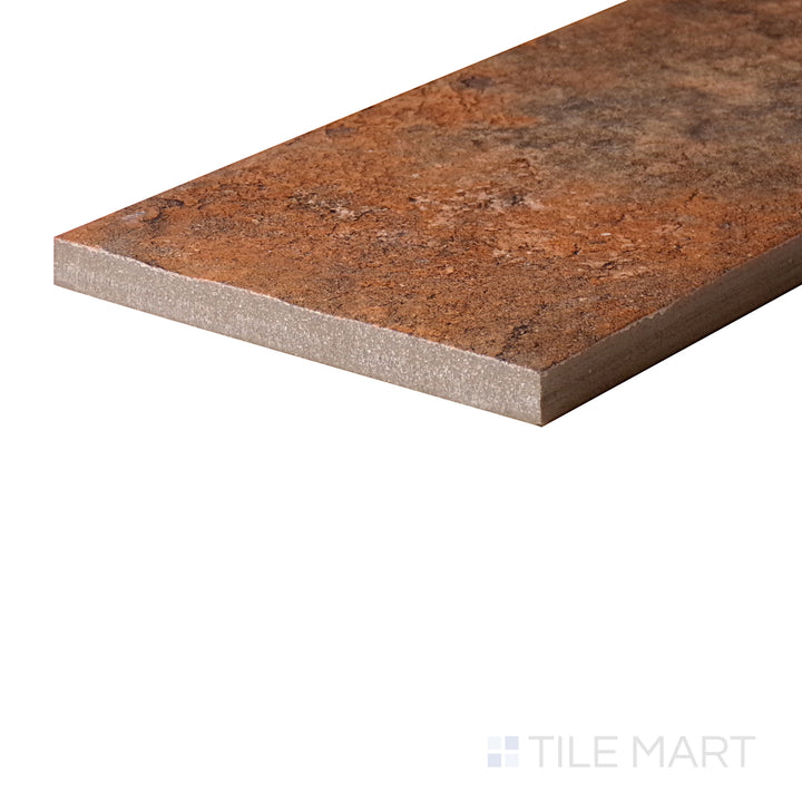 An angled look at the WRIGLEY CHICAGO tile, highlighting its smooth glaze and the boldness of its warm hue.