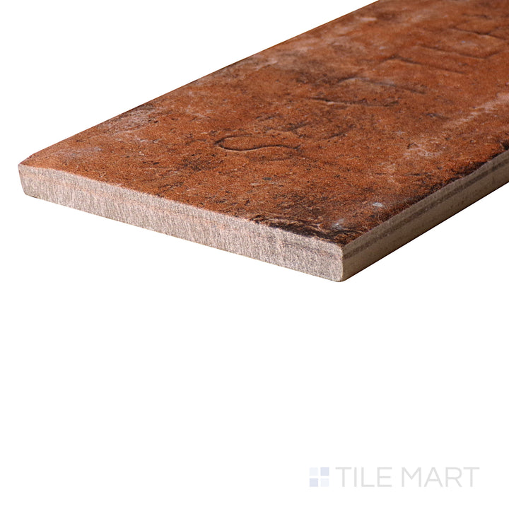 An angled look at the WRIGLEY CHICAGO tile, highlighting its glossy finish and the boldness of its deep shade.