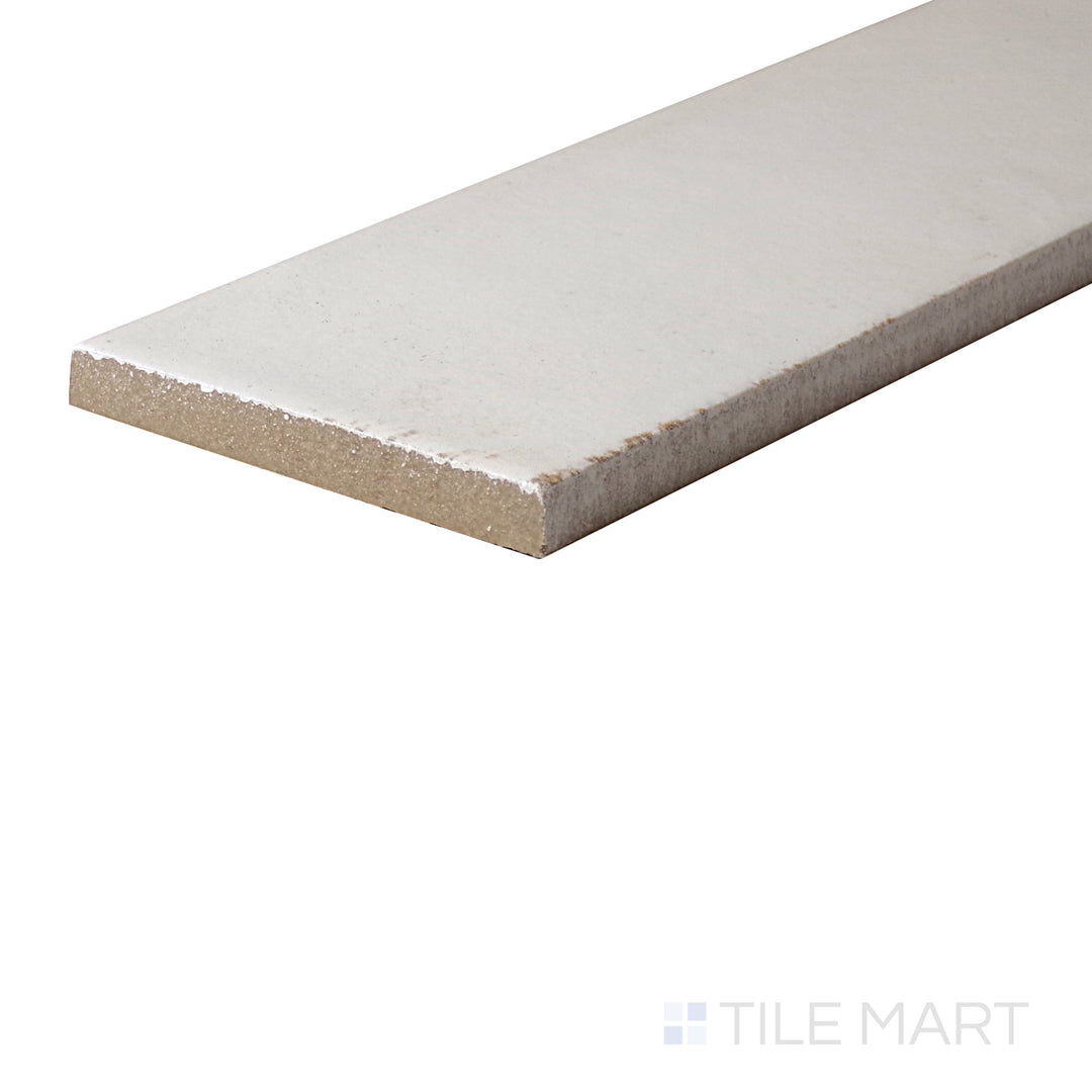 An angled look at the BIANCO EDEN tile, highlighting its textured coating and the boldness of its rich pigment.