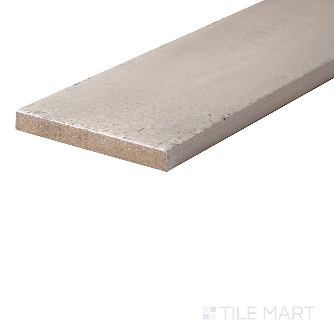 An angled look at the COTONE EDEN tile, highlighting its matte surface and the boldness of its warm hue.