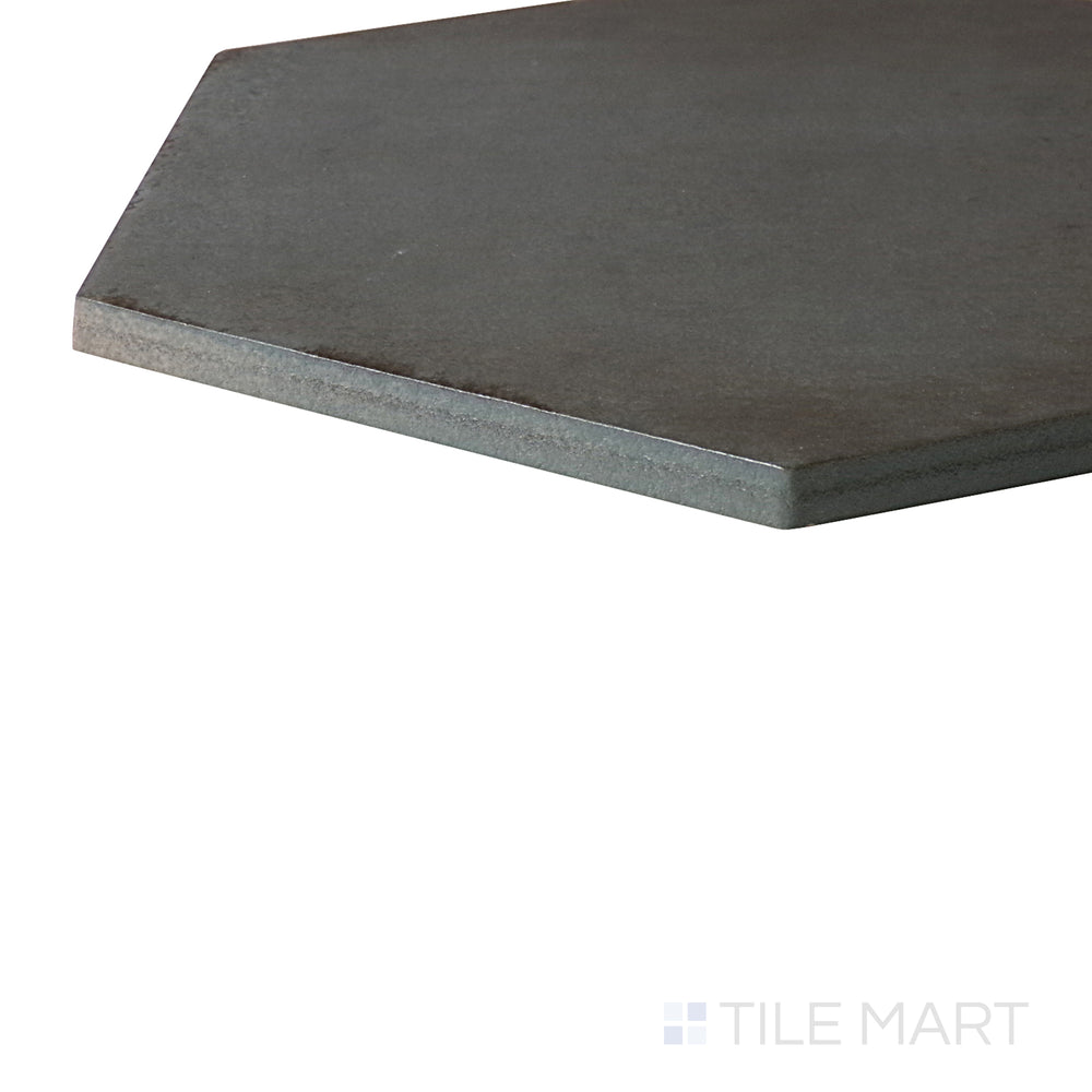 A modern space, featuring OTTANIO EDEN tile with a refined texture, bringing a sleek look to the room.