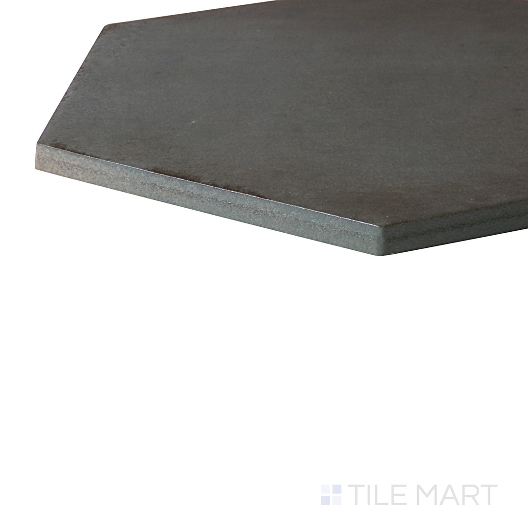 A modern space, featuring OTTANIO EDEN tile with a refined texture, bringing a sleek look to the room.