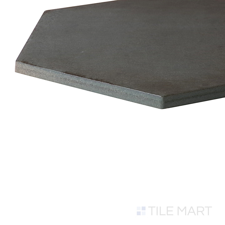 A modern space, featuring OTTANIO EDEN tile with a refined texture, bringing a sleek look to the room.