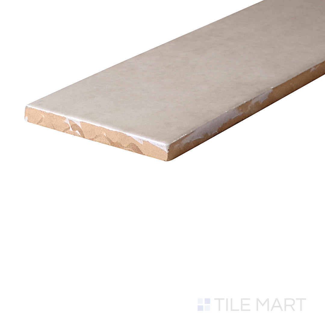 An angled look at the ALMOND HIGHLAND LAKE tile, highlighting its glossy finish and the boldness of its vivid tint.