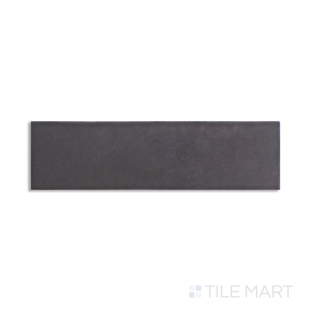 Flat perspective showcasing the CARBON HIGHLAND LAKE tile, sized 3x10, with a textured coating that enhances its soft undertone.