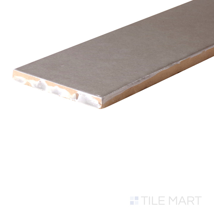 An angled look at the GRAIN HIGHLAND LAKE tile, highlighting its textured coating and the boldness of its soft undertone.