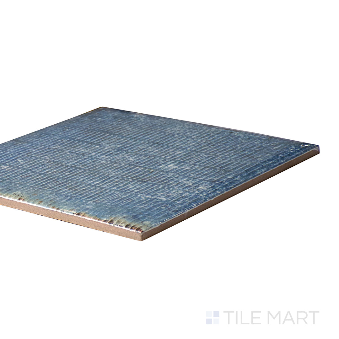 An angled look at the ATMOSPHERE INTERMIX tile, highlighting its glossy finish and the boldness of its vivid tint.