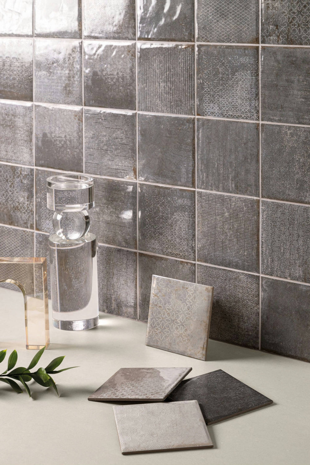 A interior view, featuring OBSIDIAN INTERMIX tile with a glossy texture, enhancing the overall ambiance.