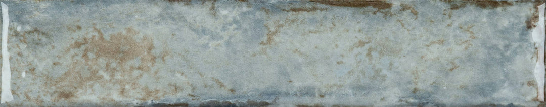 Above shot showcasing the MERCURY ORGANIC CLAY tile, sized 2x10, with a textured coating that enhances its deep shade.