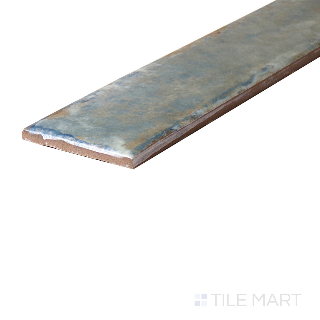 An angled look at the MERCURY ORGANIC CLAY tile, highlighting its glossy finish and the boldness of its soft undertone.