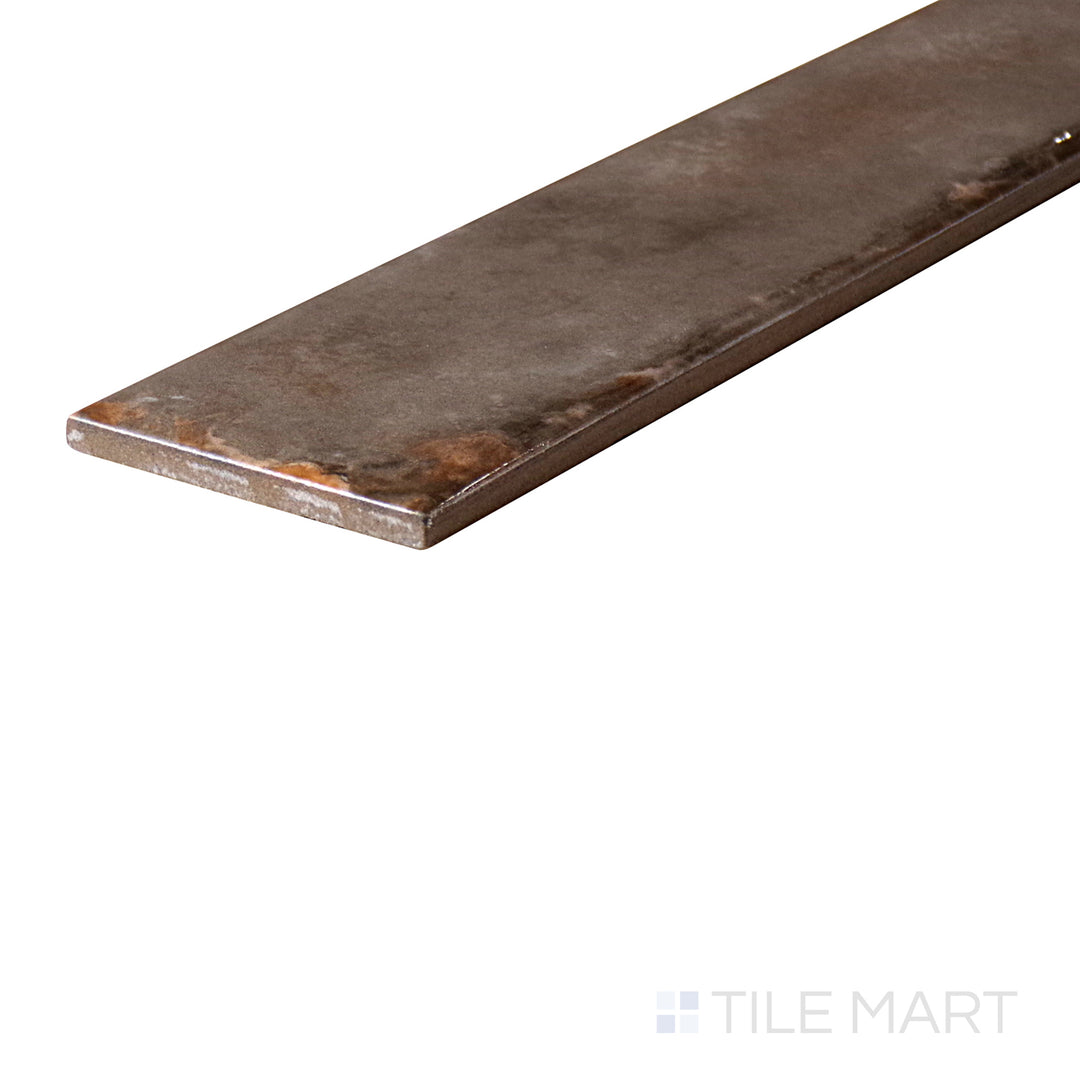 An angled look at the TAUPE ORGANIC CLAY tile, highlighting its textured coating and the boldness of its soft undertone.