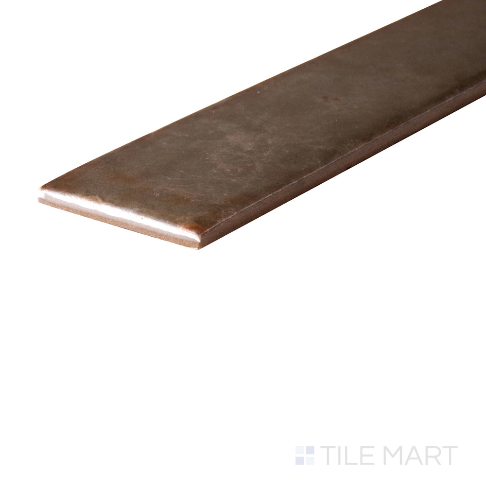 An angled look at the TAUPE ORGANIC CLAY tile, highlighting its matte surface and the boldness of its soft undertone.