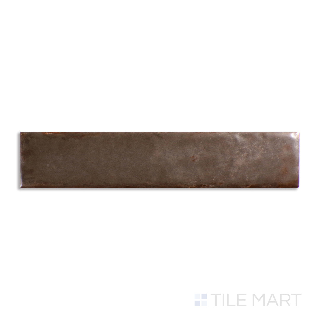 Above shot showcasing the TAUPE ORGANIC CLAY tile, sized 2x10, with a textured coating that enhances its soft undertone.