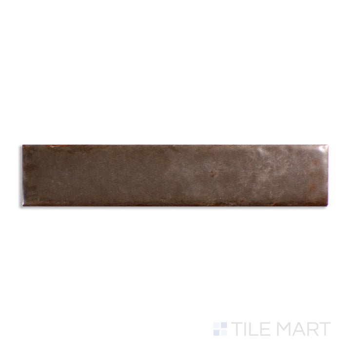 Above shot showcasing the TAUPE ORGANIC CLAY tile, sized 2x10, with a textured coating that enhances its soft undertone.