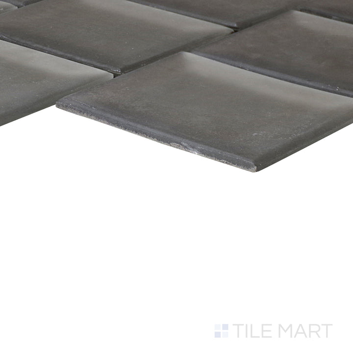 An angled look at the SAGE YOU LOVE ME PRISM tile, highlighting its smooth glaze and the boldness of its soft undertone.