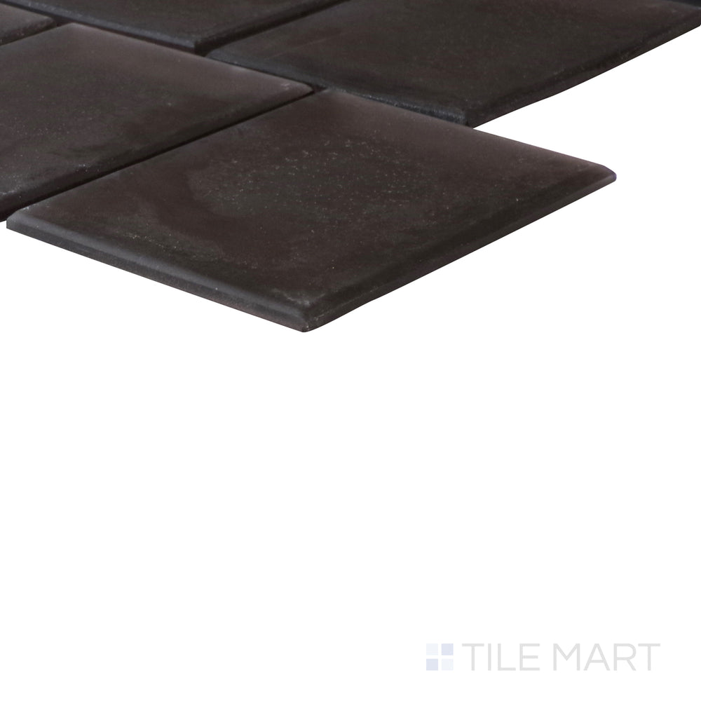 An angled look at the PURPLE HAZE PRISM tile, highlighting its smooth glaze and the boldness of its soft undertone.