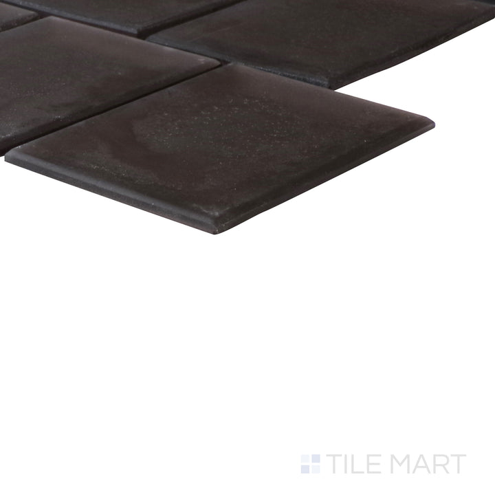 An angled look at the PURPLE HAZE PRISM tile, highlighting its smooth glaze and the boldness of its soft undertone.