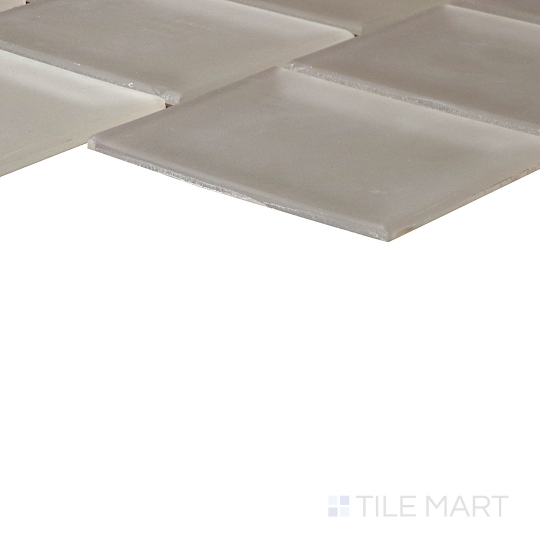 An angled look at the DIP ME IN GOLD & KISS ME ALL OVER PRISM tile, highlighting its matte surface and the boldness of its soft undertone.