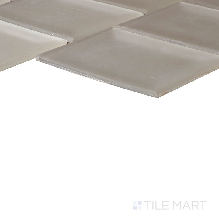 An angled look at the DIP ME IN GOLD & KISS ME ALL OVER PRISM tile, highlighting its matte surface and the boldness of its soft undertone.