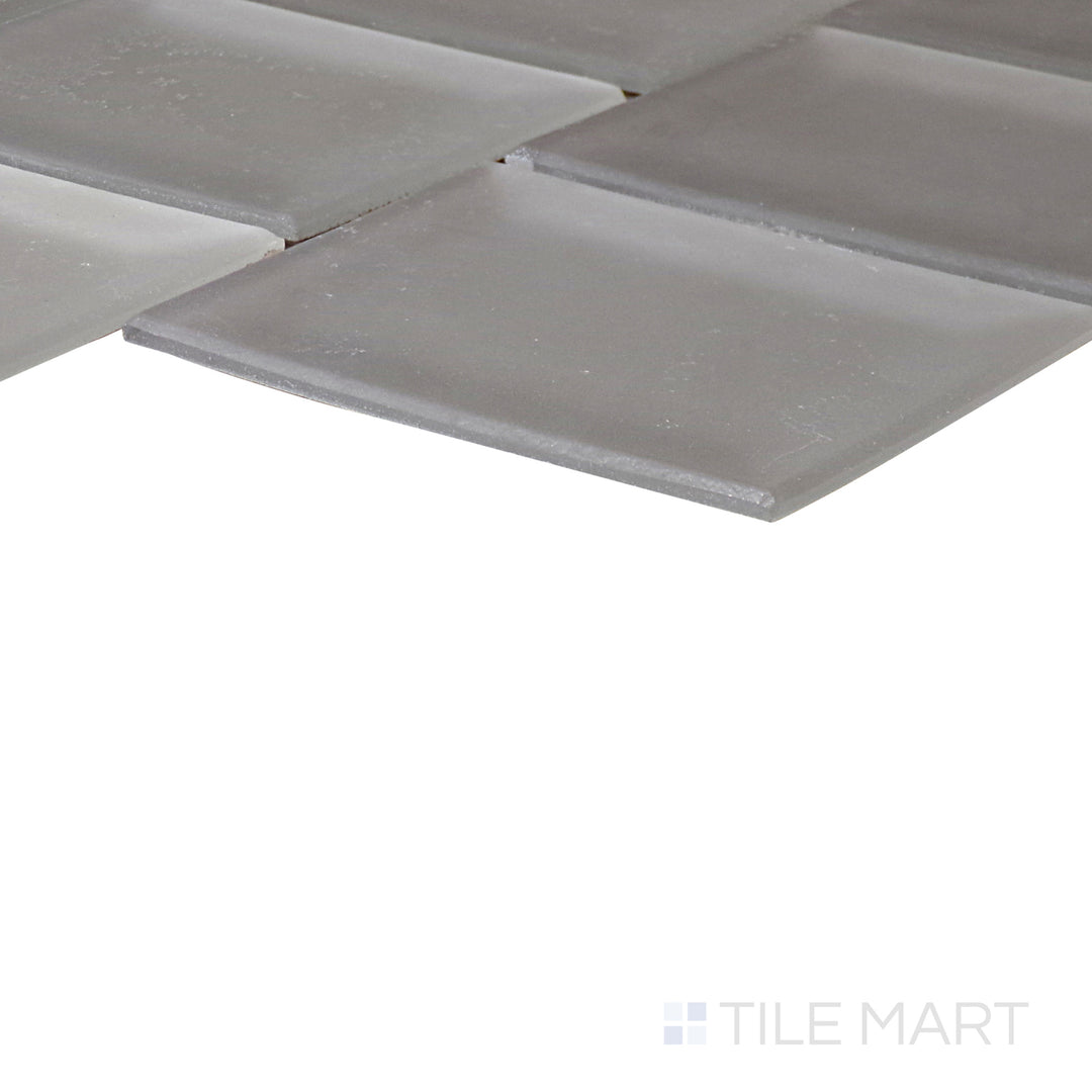 An angled look at the DIAMONDS AND PEARLS PRISM tile, highlighting its textured coating and the boldness of its soft undertone.