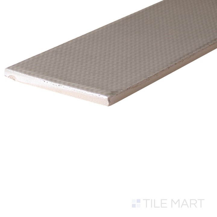 An angled look at the CONCRETE ZEN tile, highlighting its smooth glaze and the boldness of its vivid tint.