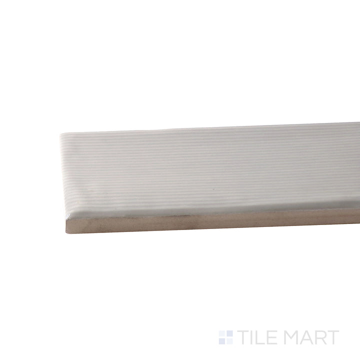 Crisp corner of the 3x12 ZEN tile, made from durable stone.