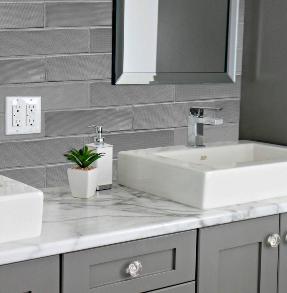 A modern space, featuring GREIGE ZEN tile with a glossy texture, offering a clean and contemporary feel.