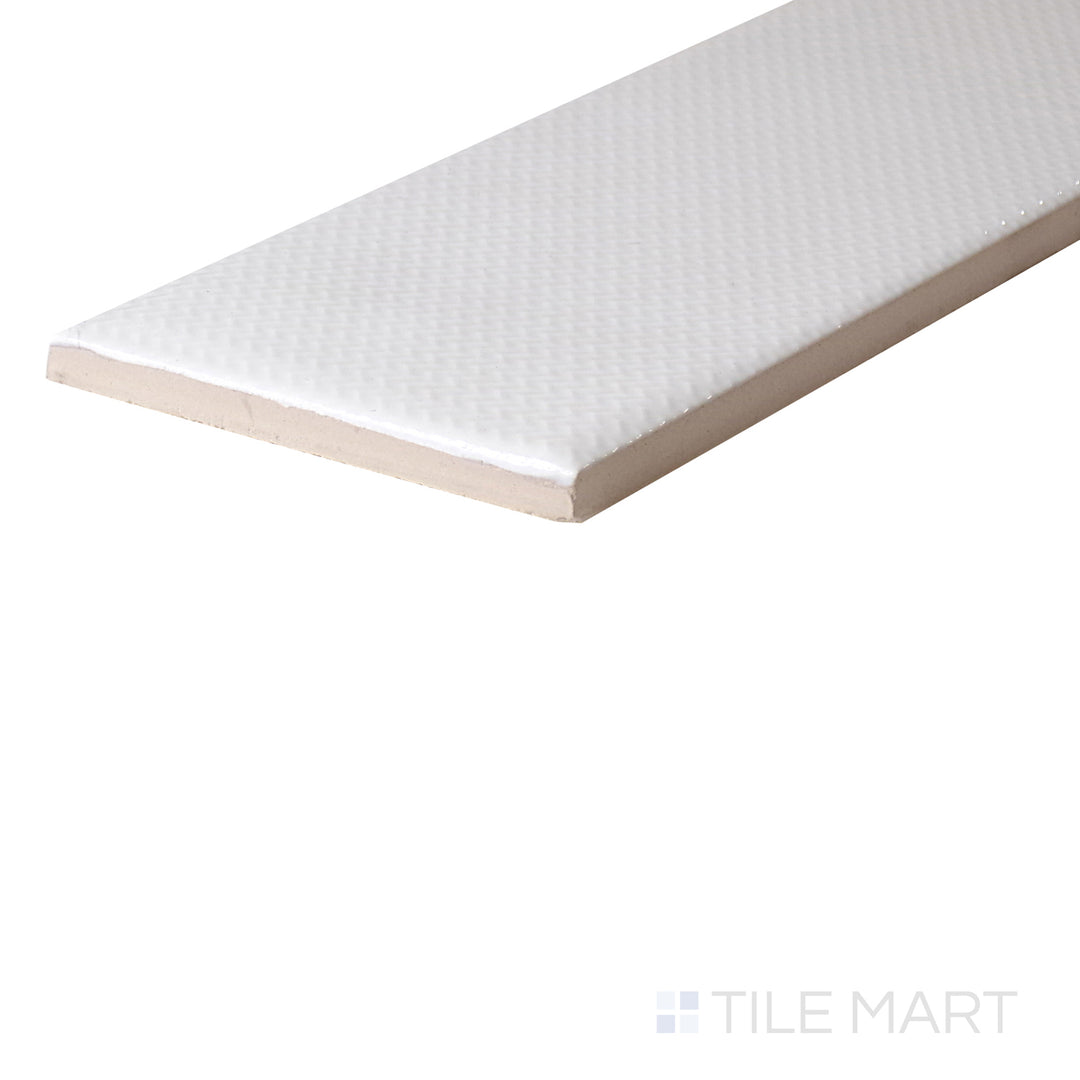 An angled look at the WHITE ZEN tile, highlighting its matte surface and the boldness of its rich pigment.