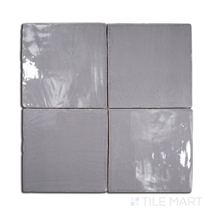 An angled look at the grey vintage tile, highlighting its smooth glaze and the boldness of its soft undertone.