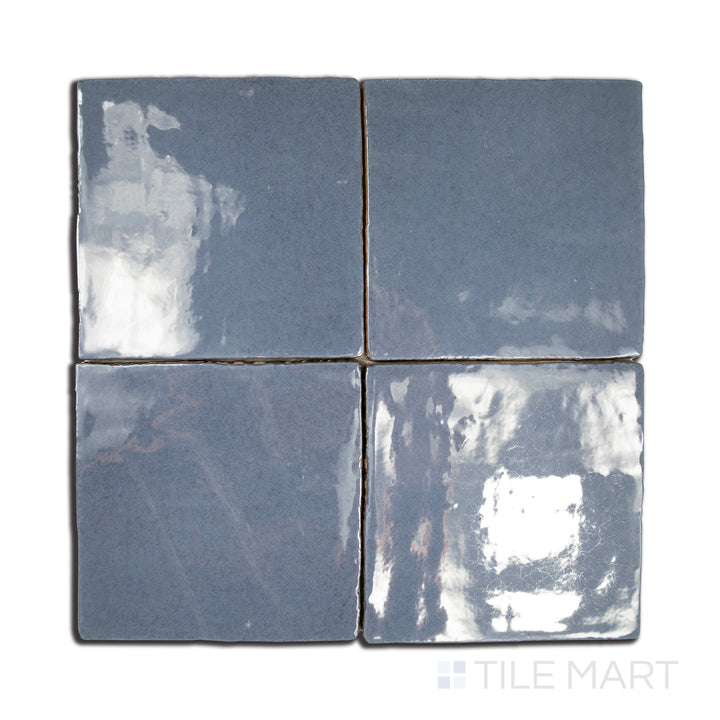 An angled look at the ocean blue vintage tile, highlighting its glossy finish and the boldness of its vivid tint.
