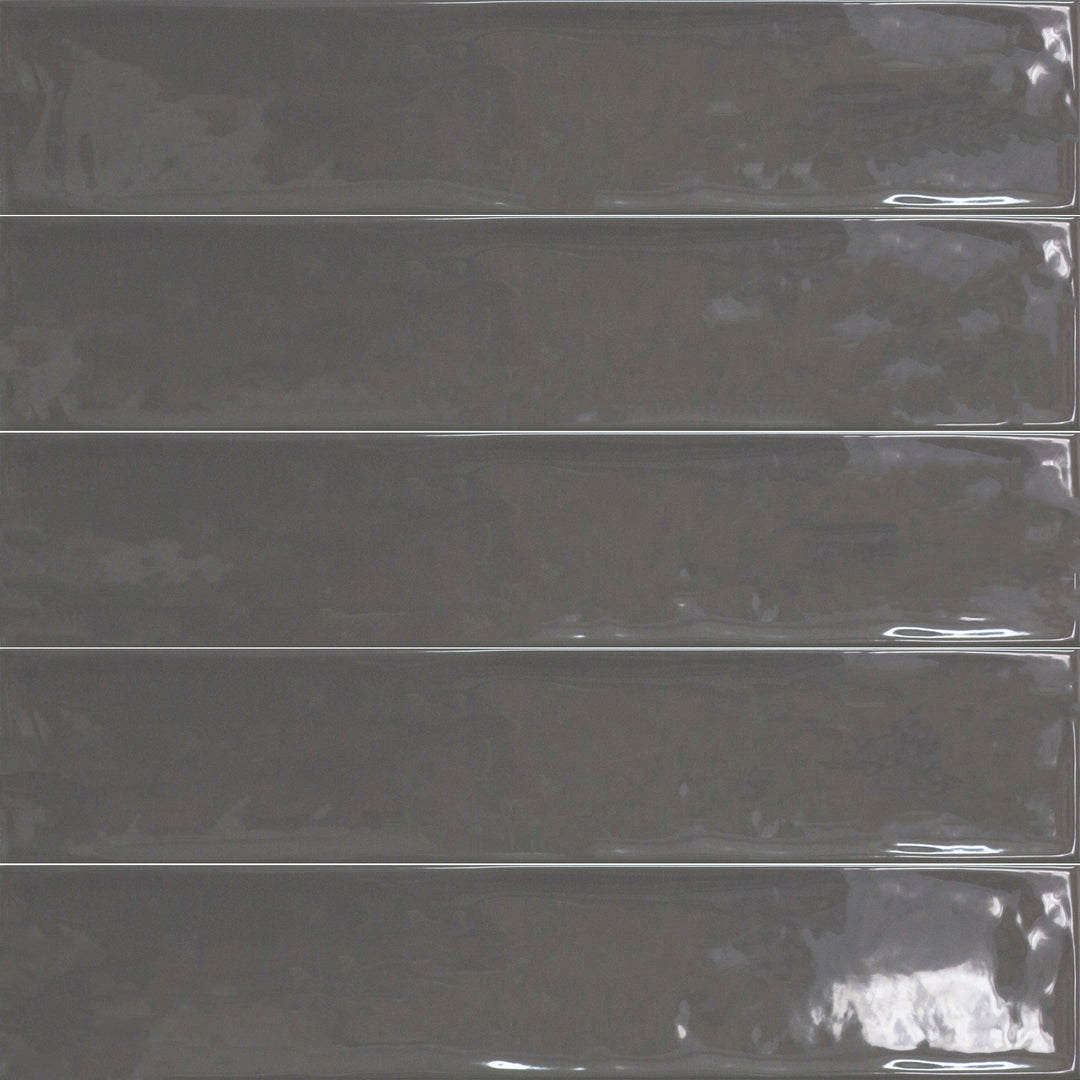 Above shot showcasing the gris ceniza maui tile, sized 4.3x21, with a matte surface that enhances its deep shade.