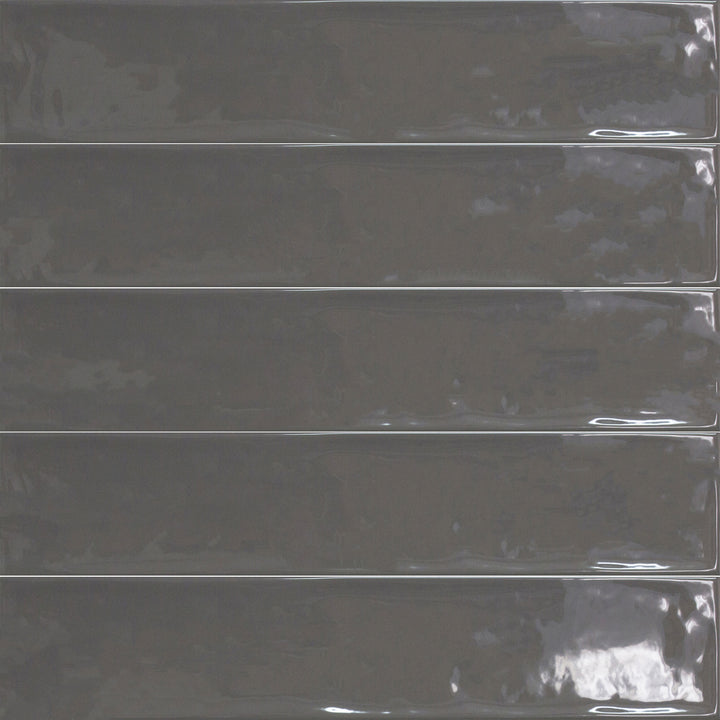 Above shot showcasing the gris ceniza maui tile, sized 4.3x21, with a matte surface that enhances its deep shade.