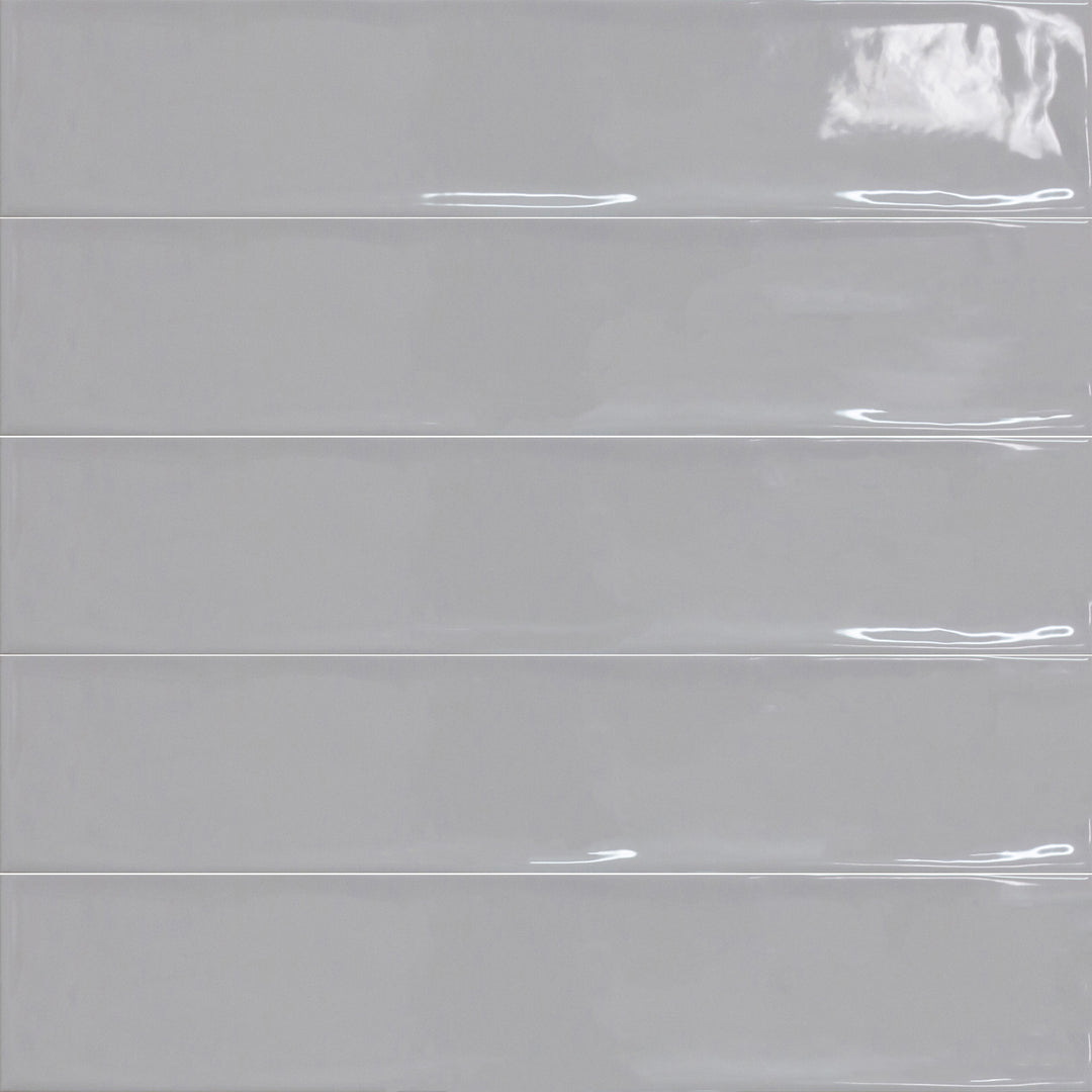 Bird's eye view showcasing the gris perla maui tile, sized 4.3x21, with a smooth glaze that enhances its rich pigment.