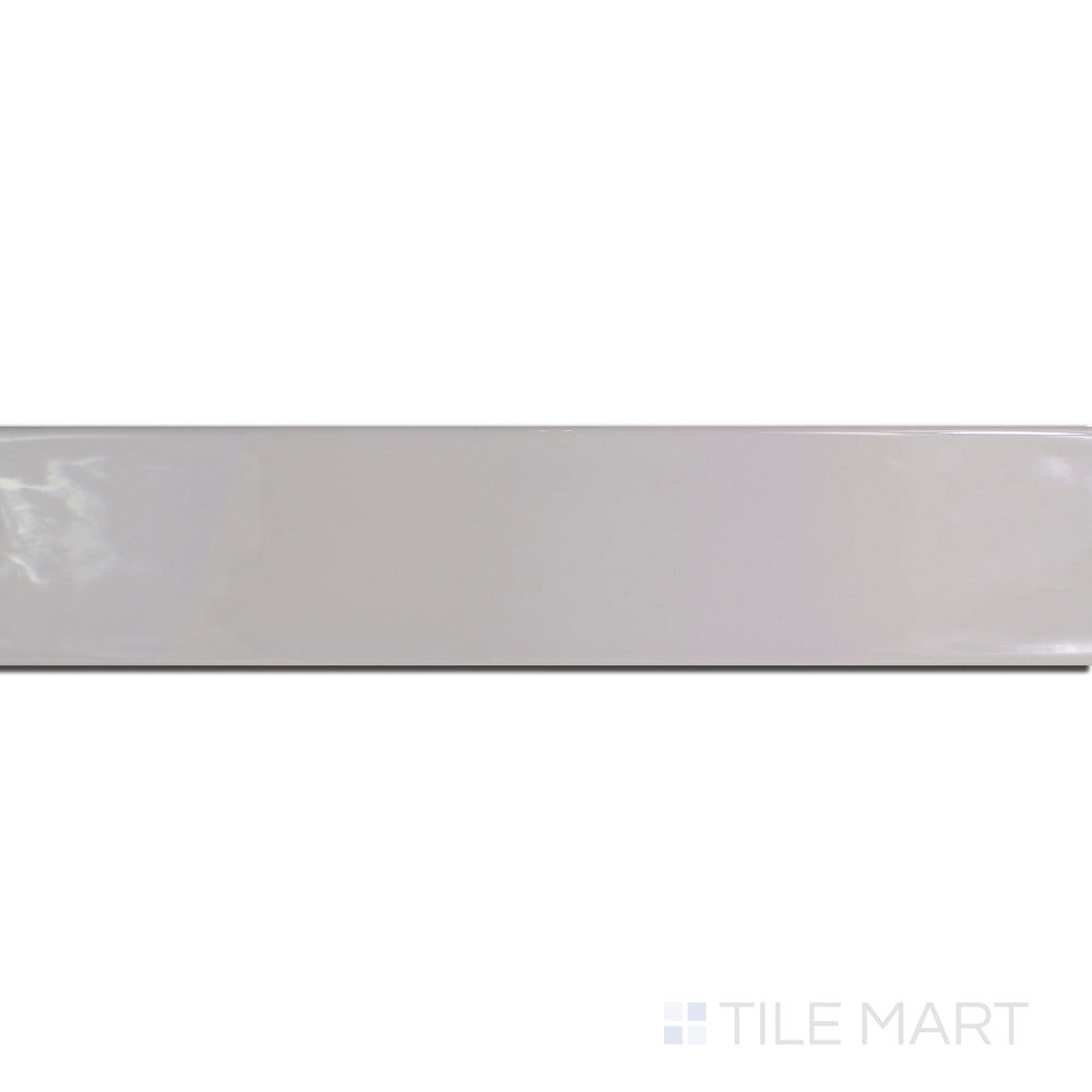 An angled look at the gris perla maui tile, highlighting its glossy finish and the boldness of its rich pigment.