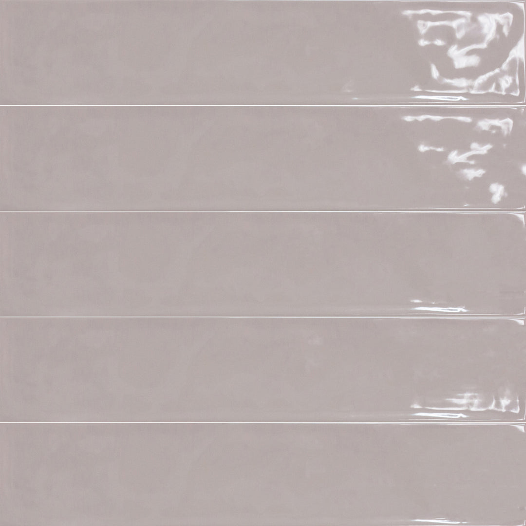 Above shot showcasing the rosa maui tile, sized 4.3x21, with a reflective sheen that enhances its rich pigment.