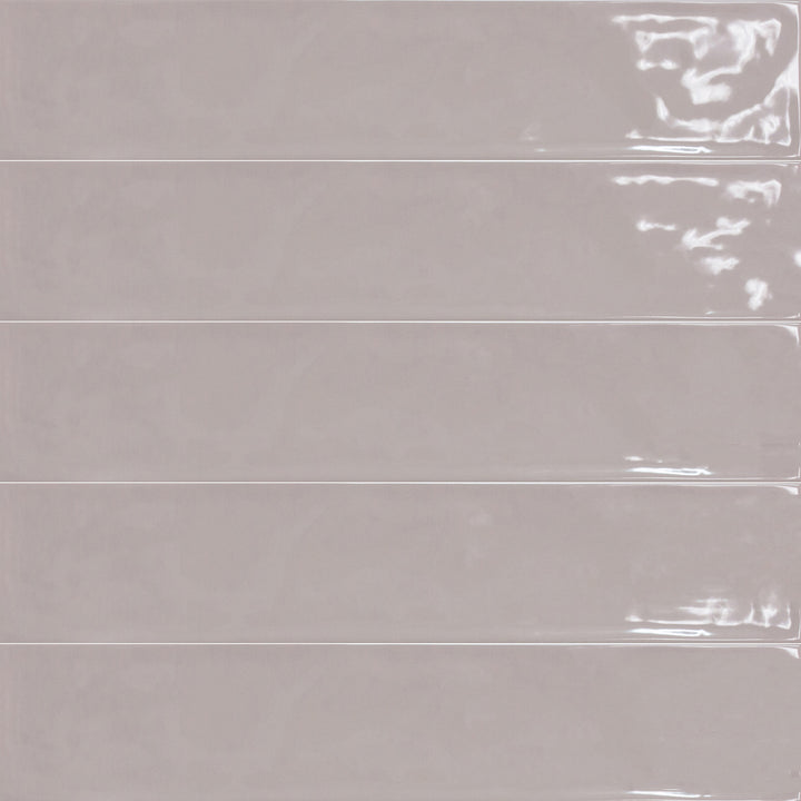 Above shot showcasing the rosa maui tile, sized 4.3x21, with a reflective sheen that enhances its rich pigment.