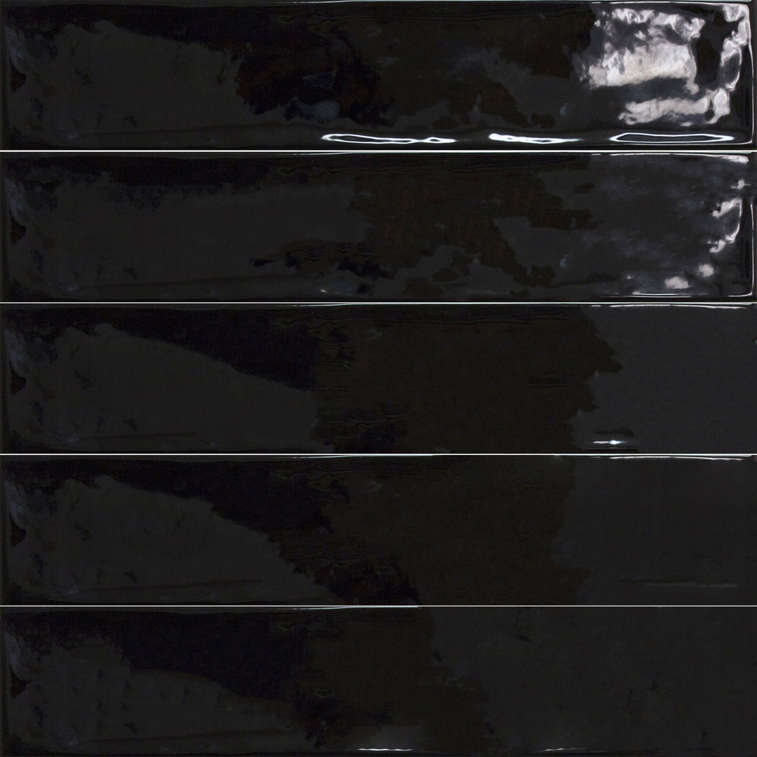 Above shot showcasing the negro maui tile, sized 4.3x21, with a smooth glaze that enhances its warm hue.