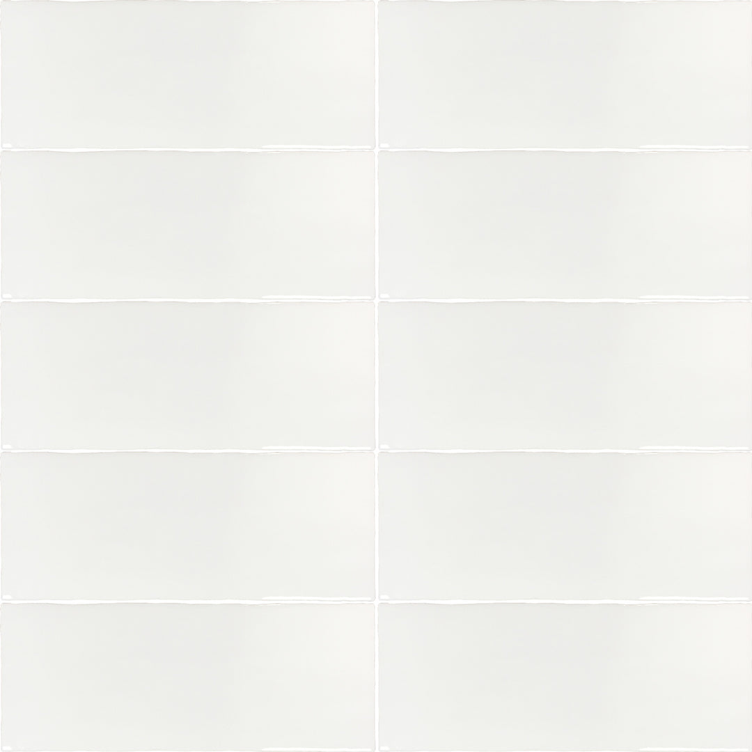 Top angle showcasing the blanco madrid tile, sized 5x14, with a smooth glaze that enhances its deep shade.