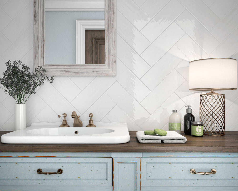 A lifestyle setting, featuring blanco madrid tile with a glossy texture, adding a modern touch to the space.