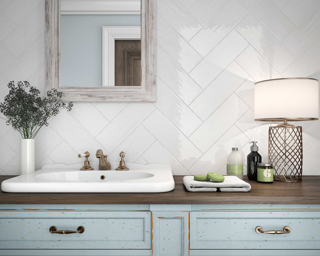 A lifestyle setting, featuring blanco madrid tile with a glossy texture, adding a modern touch to the space.