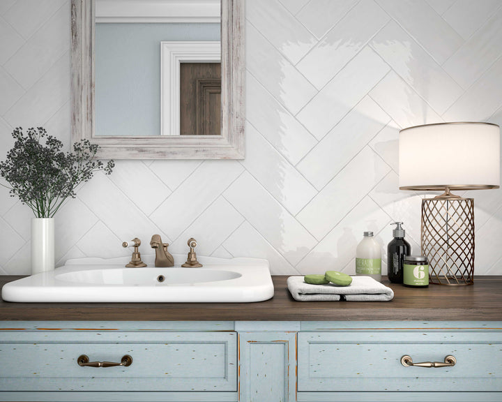 A lifestyle setting, featuring blanco madrid tile with a glossy texture, adding a modern touch to the space.