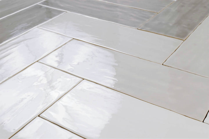 A crisp white shade with a sleek, elongated design, Madrid Blanco 5x14 glossy ceramic offers a timeless and versatile look.